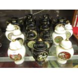 A collection of Chokin 24ct gold rimmed lidded jars and vases