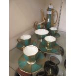A Royal Doulton tea set comprising tea pot, cream jug,