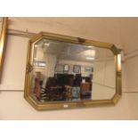 A modern gilt framed wall mirror