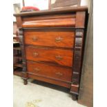 A late 19th century walnut chest of four long drawers