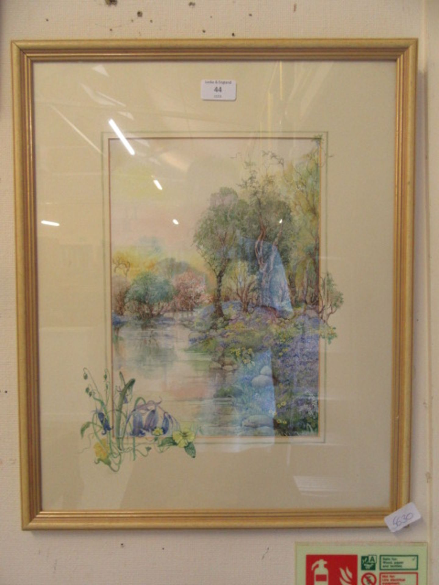 A framed and glazed watercolour of river scene signed Glenda Rae