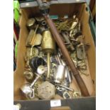 A tray containing a quantity of plated and brass ware to include flatware, horse brasses etc.