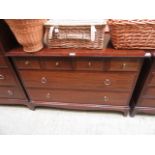 A stag minstrel chest of four small drawers over two long drawers
