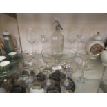 A collection six Babycham glasses together with a set of four glasses,
