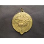 A gilt metal Universal Exhibition 1913 in Flanders medal