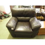 A brown leather easy chair