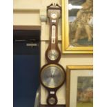 A reproduction mahogany banjo barometer by Sewills of Liverpool