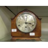 A walnut cased Westminster chime mantle clock