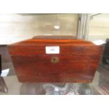 An early 19th century rosewood tea caddy