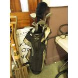 A canvas golf bag with a selection of clubs
