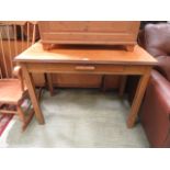 A mid 20th century oak desk