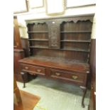 A reproduction 18th century style oak dresser,