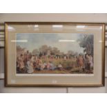 A framed and glazed print of cricket match scene signed Sturgeon