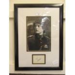 A framed and glazed photograph with an inserted autograph Kyle Maclachlan