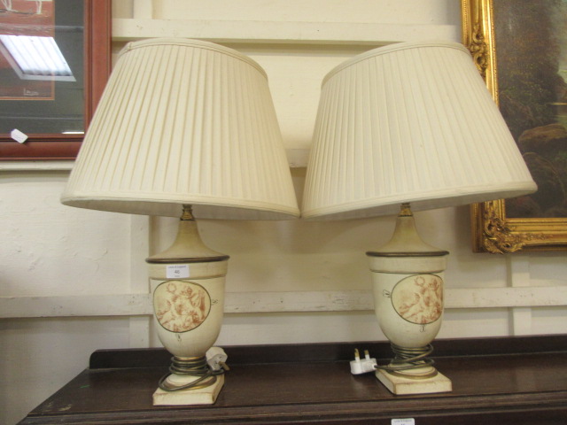 A pair of modern table lamps with classical urn design columns