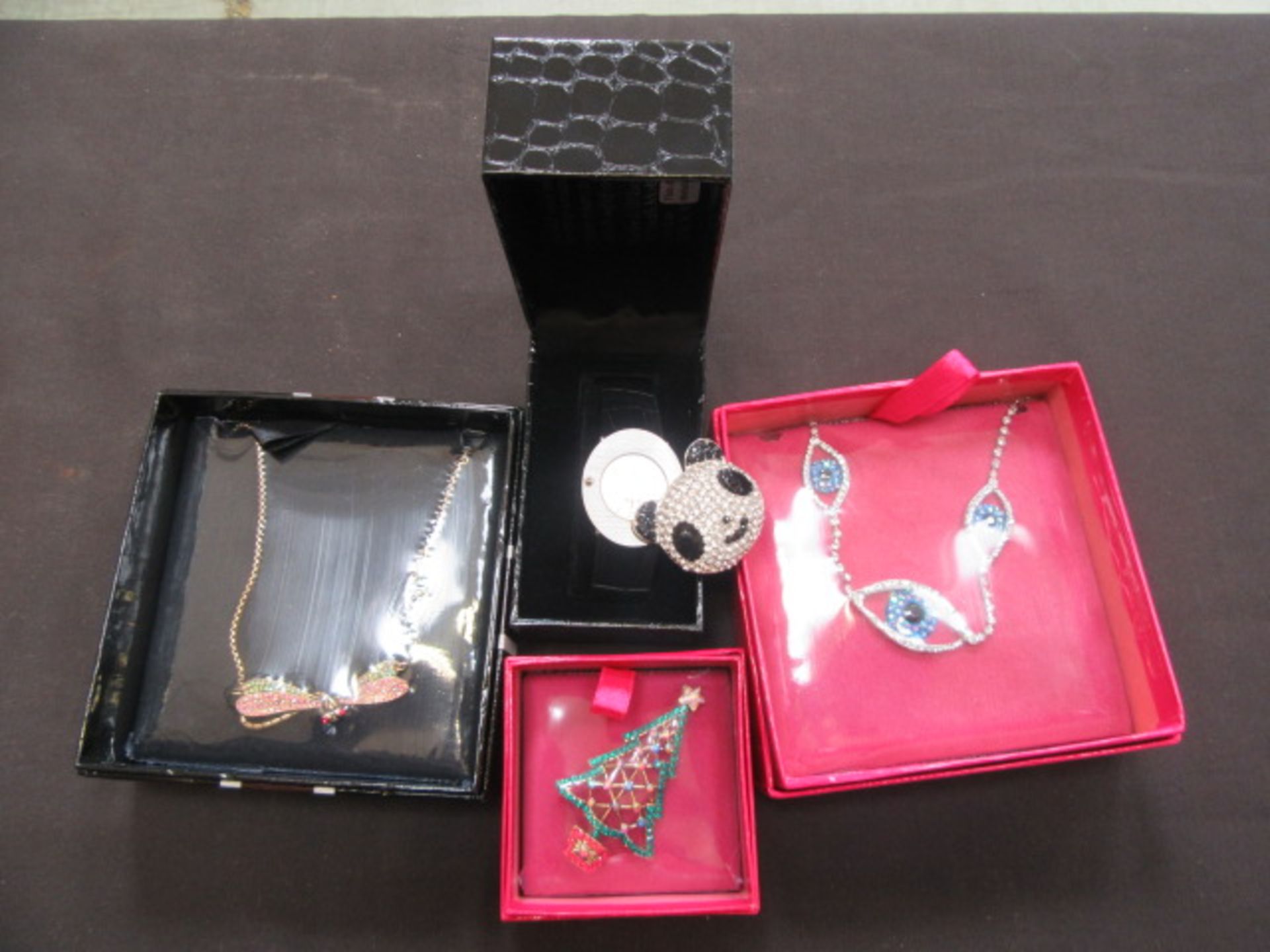 Four items of modern jewellery to include necklaces,