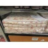 Two bagged as new pink floral printed quilted bed spreads measuring 240cm by 260cm