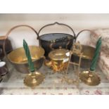 A selection of early 20th century cookware to include two brass jam pans, enamelled cook pot,
