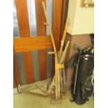 A selection of long handled garden tools to include scythe, bolt croppers, sledgehammer, picks,