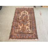A hand woven Indian rectangular multi coloured rug depicting the tree of life