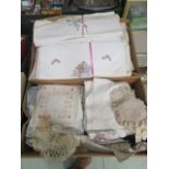 Two boxes of assorted embroided linen, laceware,