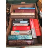 A tray of assorted interesting books to include guns, the holy bible,