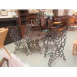 A blacksmiths constructed garden table and chairs manufactured from horseshoes comprising of table