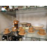 A set of six mid-20th century Tams cups and saucers together with a similar matching coffee pot,