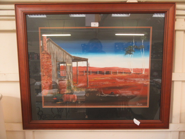 A framed and glazed oil painting of Australian scene signed L.