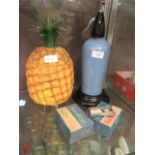 A 1960s ice bucket in the form of a pineapple, soda siphon etc.