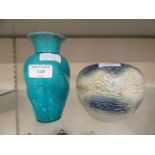 A turquoise glazed vase together with a blue glazed vase