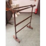 An early 19th century mahogany towel rail (A/F)