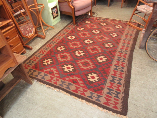 A Kilim Maymana Afghan rug measuring 168cmx244cm