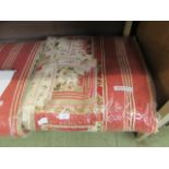 A red and cream quilted bed throw measuring 250cm by 265cm