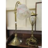 A pair of brass table lamps