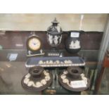 A selection of Wedgwood Jasper ware to include clocks, water jug, candle sticks etc.