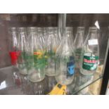 A selection of advertising milk bottles