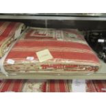 A red and cream quilted bed throw measuring 250cm by 265cm