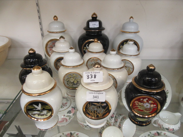 A collection of Chokin lidded 24ct gold rimmed vessels