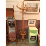 A modern bent wood hat stand