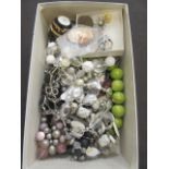 A carton of assorted costume jewellery,