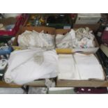 Four boxes of assorted linen, laceware,