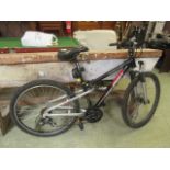 A black and red Apollo mountain bike (A/F)