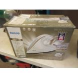 A boxed Phillips steam iron