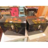 A pair of Chinese style lacquered boxes with brass handles