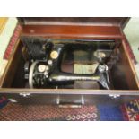 A cased manual sewing machine