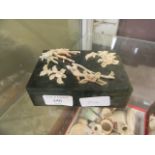 An oriental marble lidded box with bone design to top