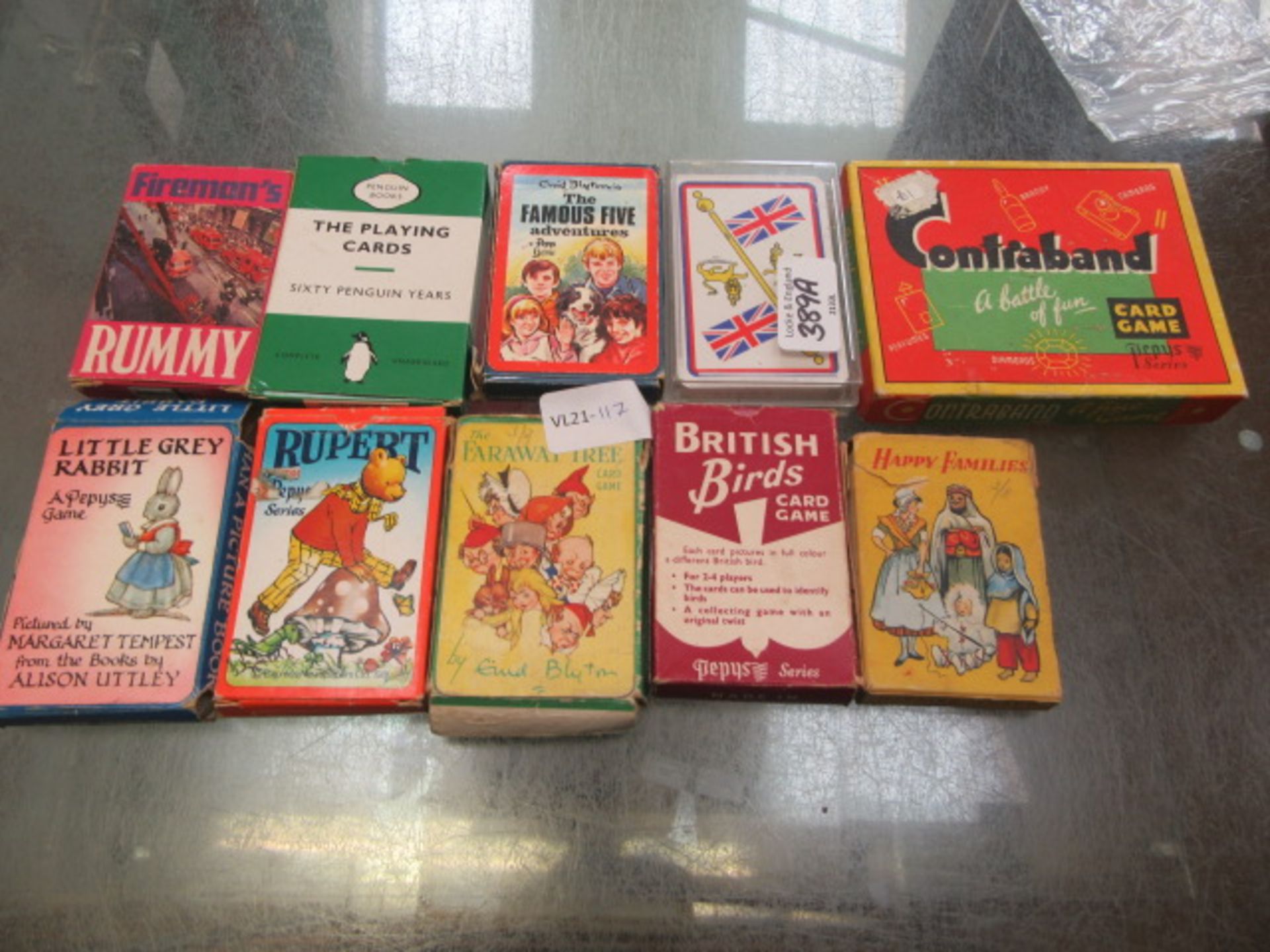 A selection of playing cards to include Happy Families, The Famous Five etc.