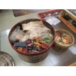 Two old sweet tins containing an assortment of buttons