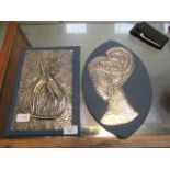 Two embossed pewter plaques,